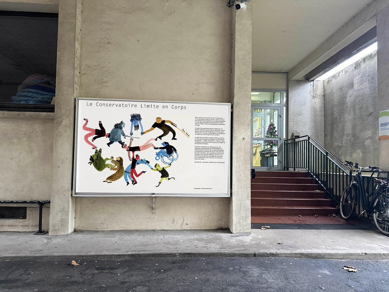 Large poster including an illustration on the external wall of a building.